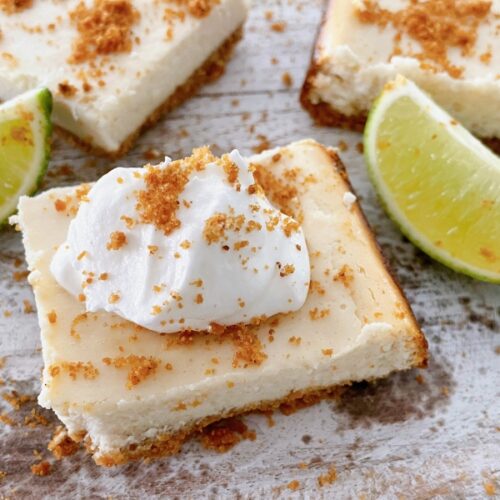 3 key lime cheesecake bars with limes