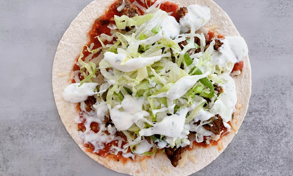 one mexican tortilla pizza with veggies