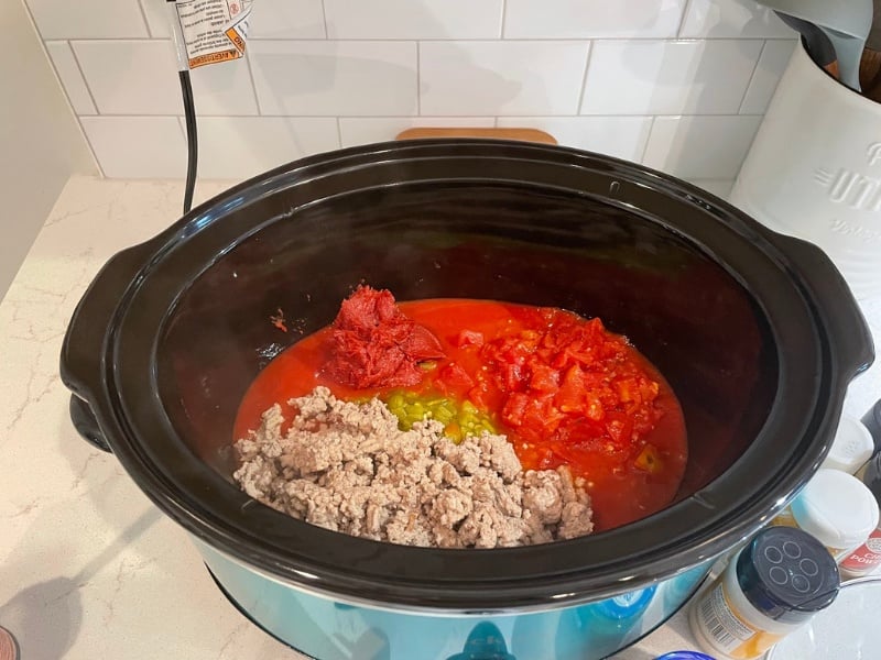 all chili ingredients in the crockpot