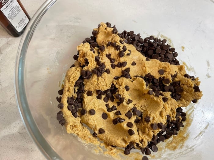 mixing ingredients in bowl for Copycat Perfect Bars