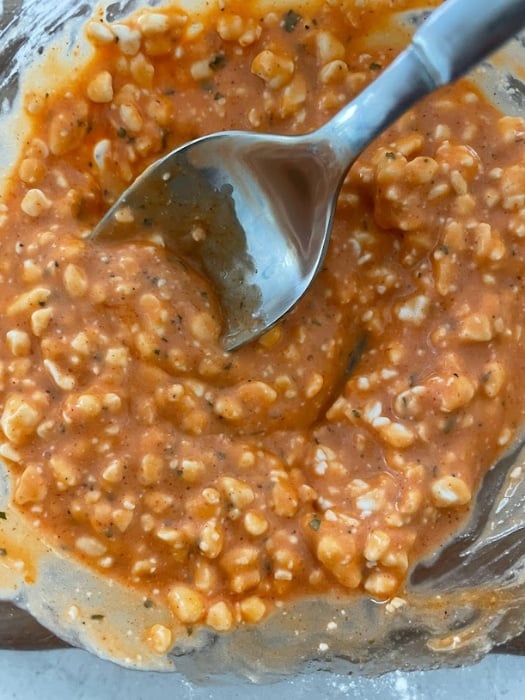 mixing the cottage cheese