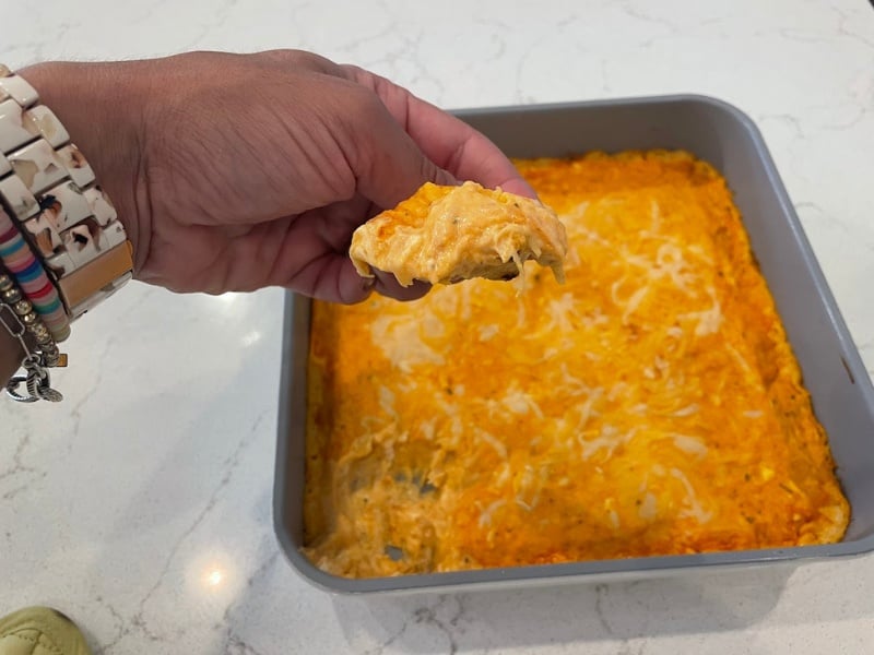 taking a bite of my healthy buffalo chicken dip taking a bite of my healthy buffalo chicken dip