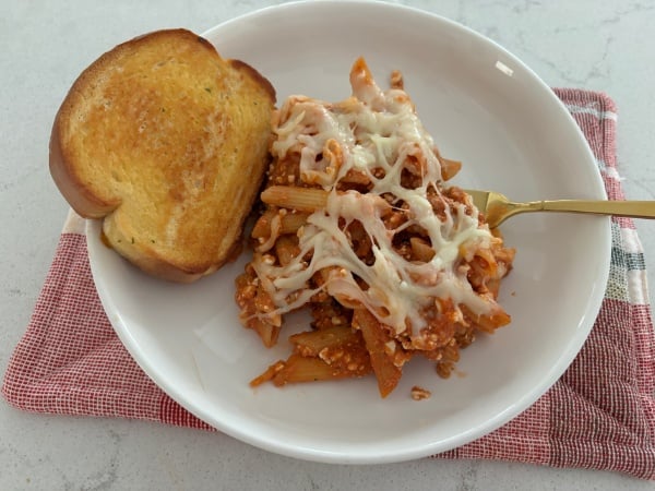 garlic bread and a piece of the cottage cheese pasta bake