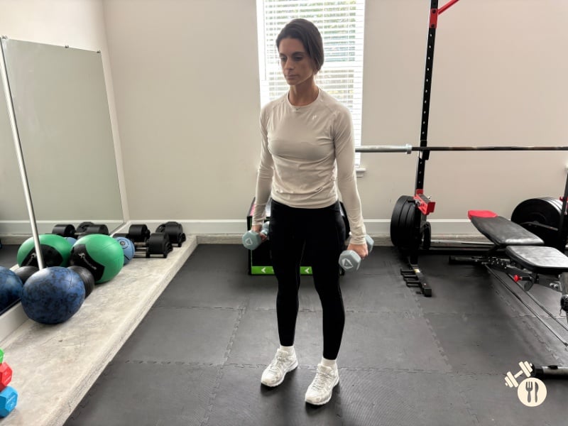 Dumbbell Lateral Raises down position Dumbbell Lateral Raises down position