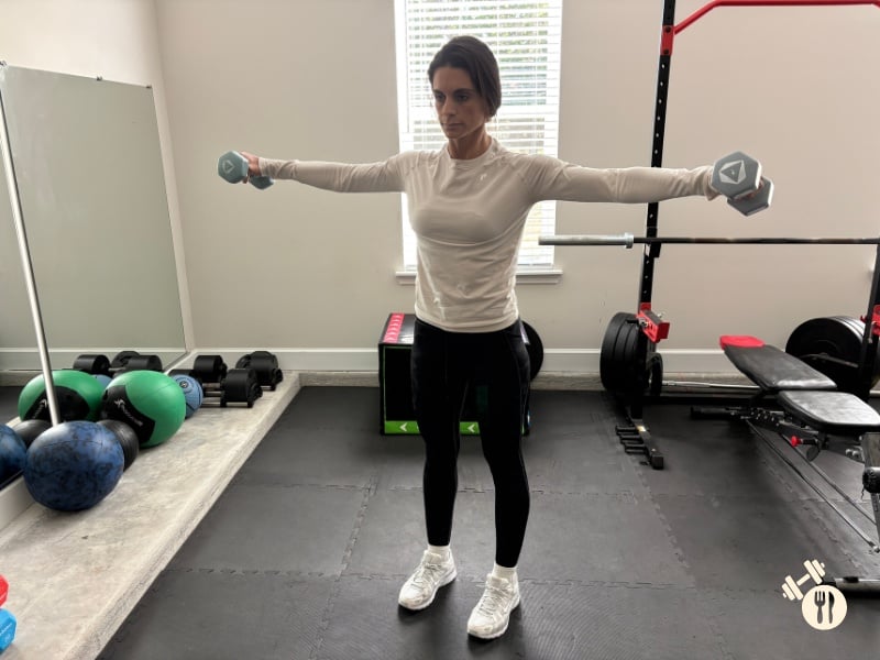Dumbbell Lateral Raises up position Dumbbell Lateral Raises up position