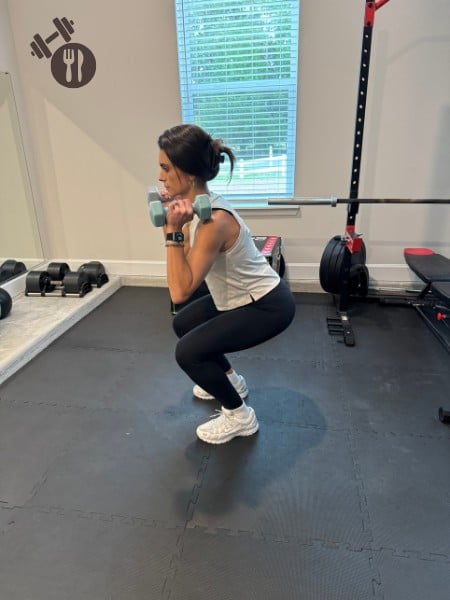 Squat to Dumbbell Press - down position Squat to Dumbbell Press - down position